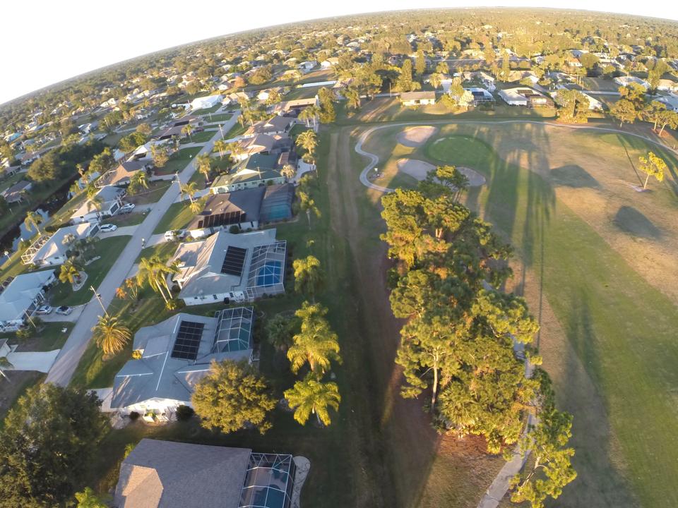 Houses surround the Palms golf course in Rotonda West, Florida.