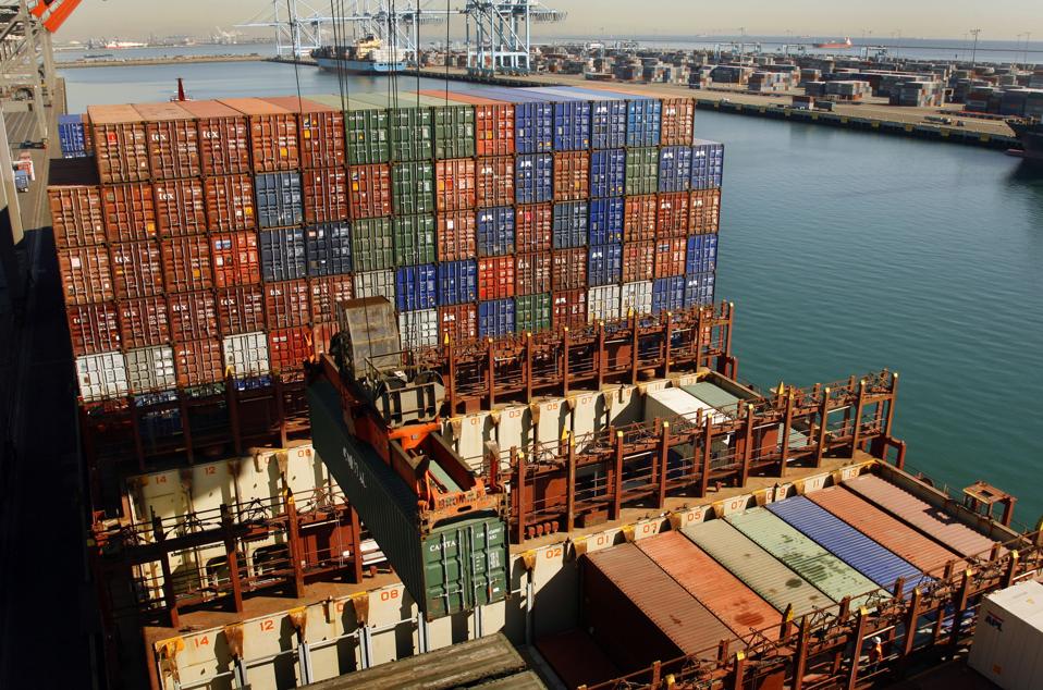Los Angeles, Ca. Shipping containers are offloaded from the container ship APL Singapore onto Ter