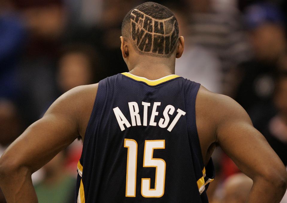 Indiana Pacers forward Ron Artest sports the phrase 'Tru Warier' carved in his hair during a game a