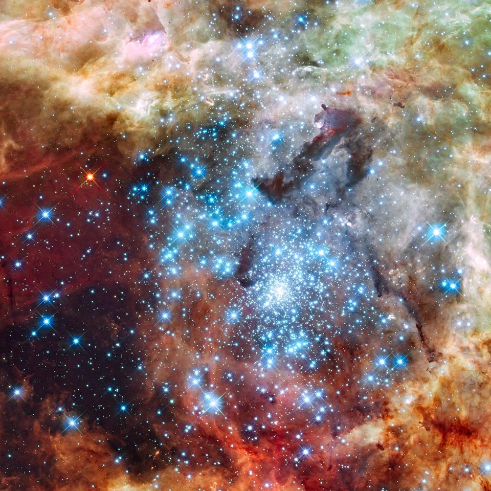Telescopio spaziale Hubble della fusione degli ammassi stellari nel cuore della Nebulosa Tarantola.