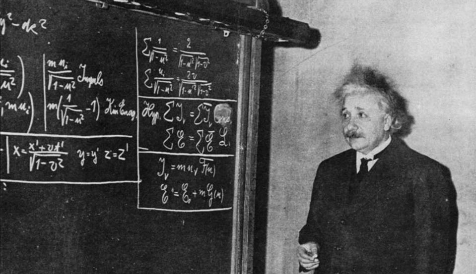 Einstein deriving special relativity, for an audience of onlookers, in 1934.