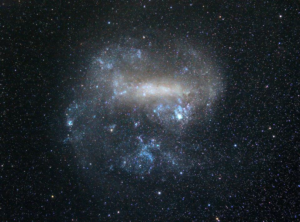 The Large Magellanic Cloud with its giant star-forming region: the Tarantula Nebula.