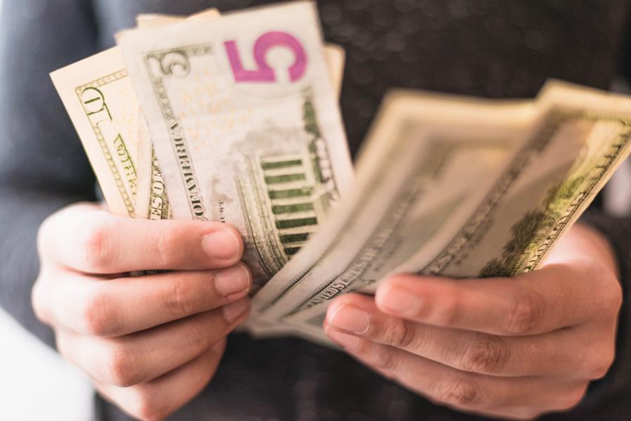 Science Asks: Do Pretty People Really Make More Money?