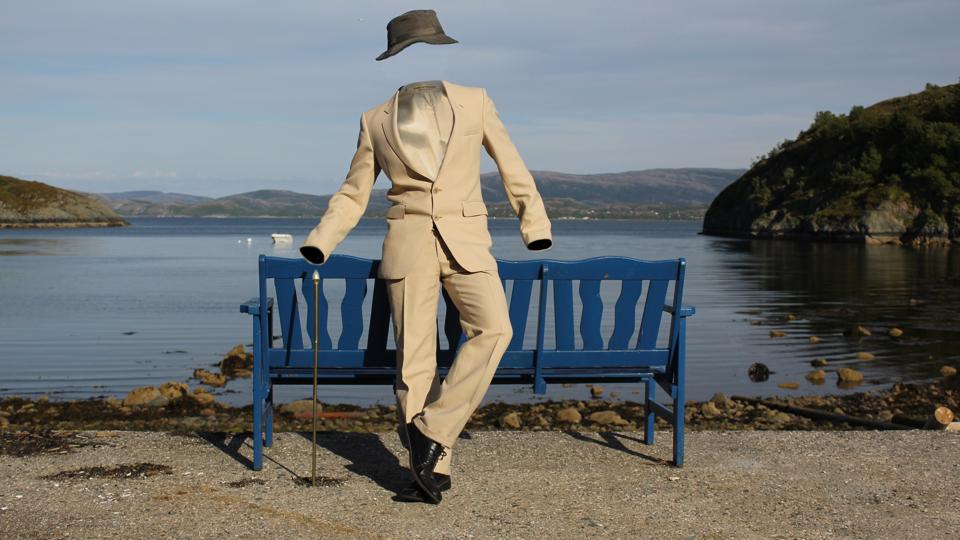 The Invisible Man in a Suit