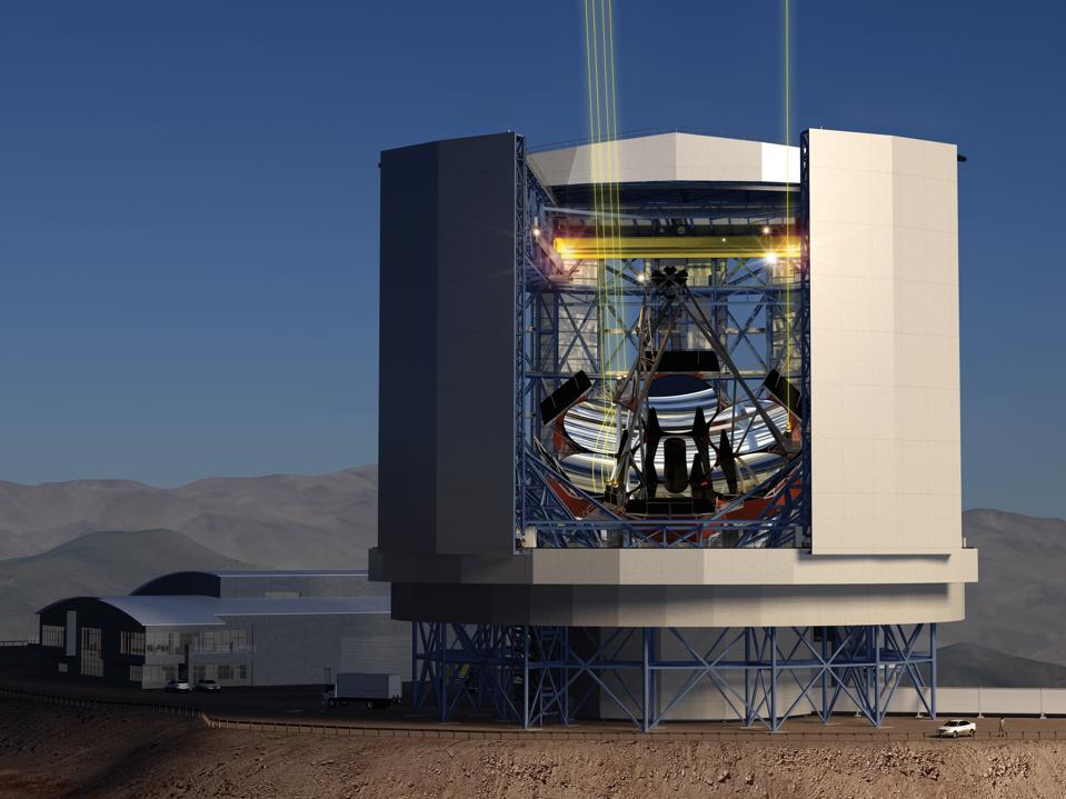 A side-view of the completed GMT as it will look in the telescope enclosure.