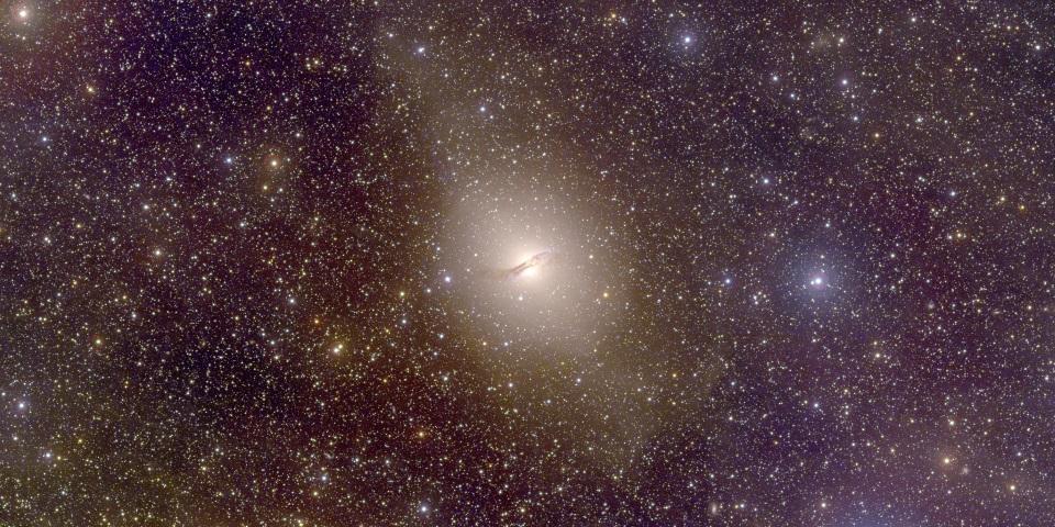 The galaxy Centaurus A has a dusty disk component in it, but is elliptical, overall.