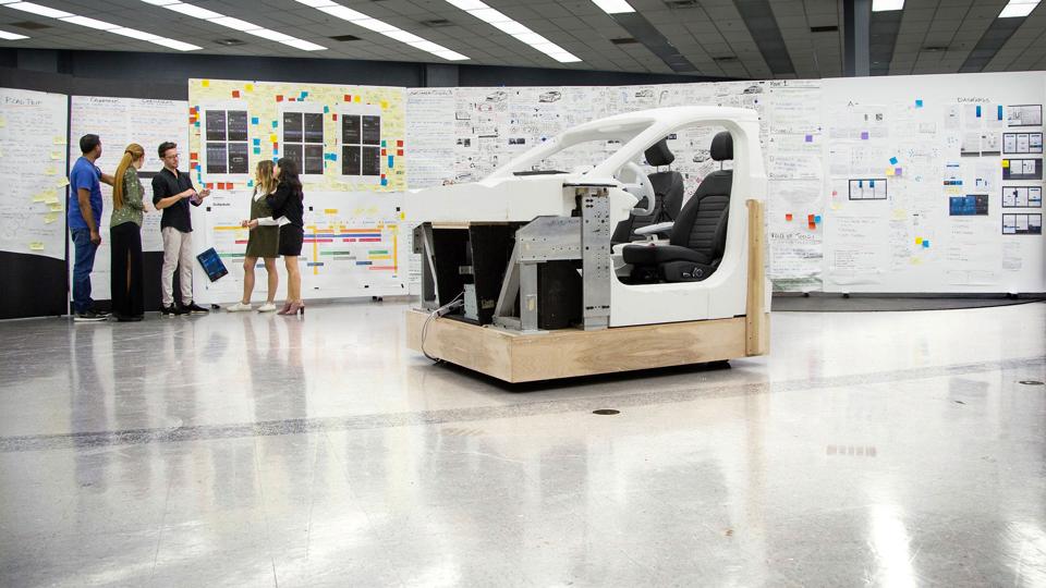 Hackett pushed Ford engineers and designers to get into the minds of consumers to understand why they wanted larger display screens in their vehicles.