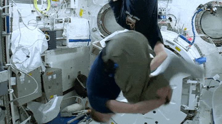 Angular momentum is conserved, but may be exchanged between systems via torques.