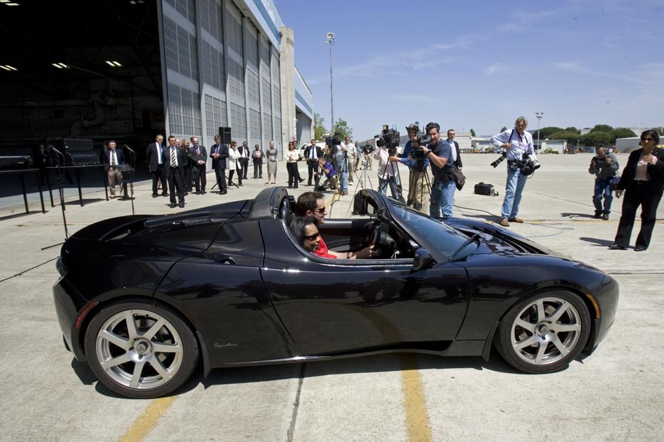 Many industry insiders believe the new Tesla Roadster should be pushed to the front of the pack as it will make the most impact for the embattled electric carmaker.