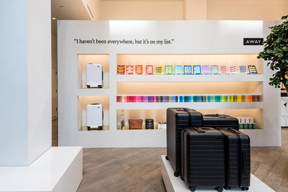 Selling wanderlust: Away's half-dozen stores, including its flagship in New York's NoHo neighborhood, feature travel books and tarot readings.