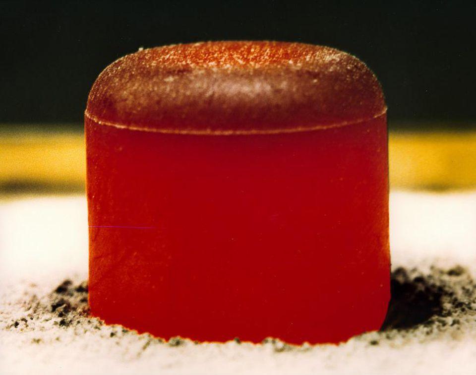 A pellet of Plutonium Oxide, which is warm to the touch and glows under its own power.
