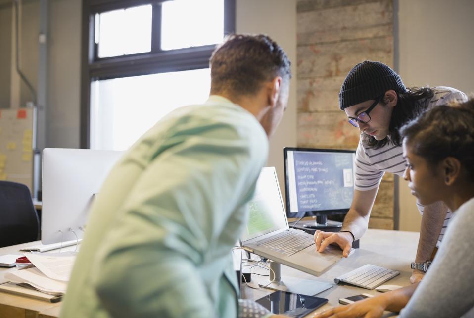Creative business people working in office