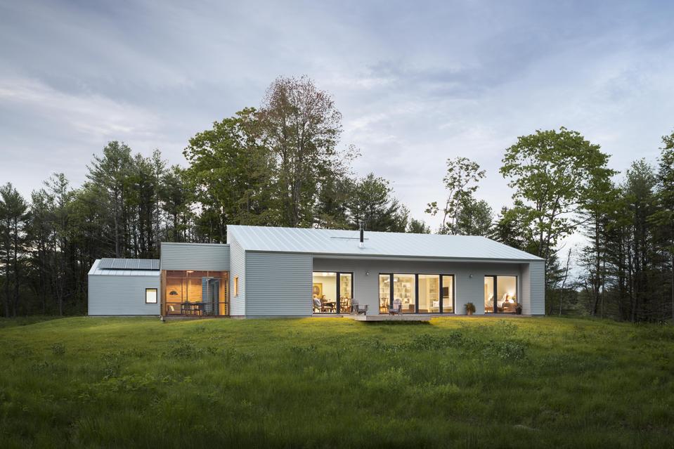 This very energy efficient house built with structural insulated panels has a standing seam roof which is just one of the many green features in this house. It was design and built by GOLogic in Maine.