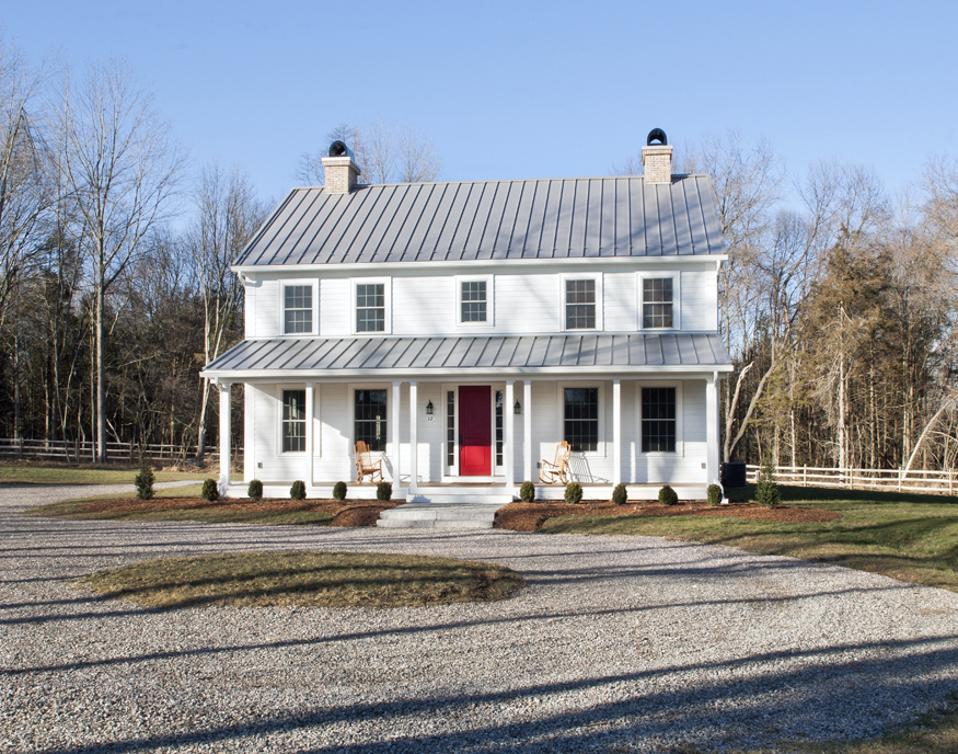 This classic modular house designed by New World Homes and manufactured by Signature Building Systems has many energy and green features including a standing seam roof.