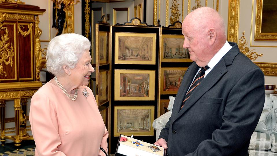 John Mars with Queen Elizabeth II