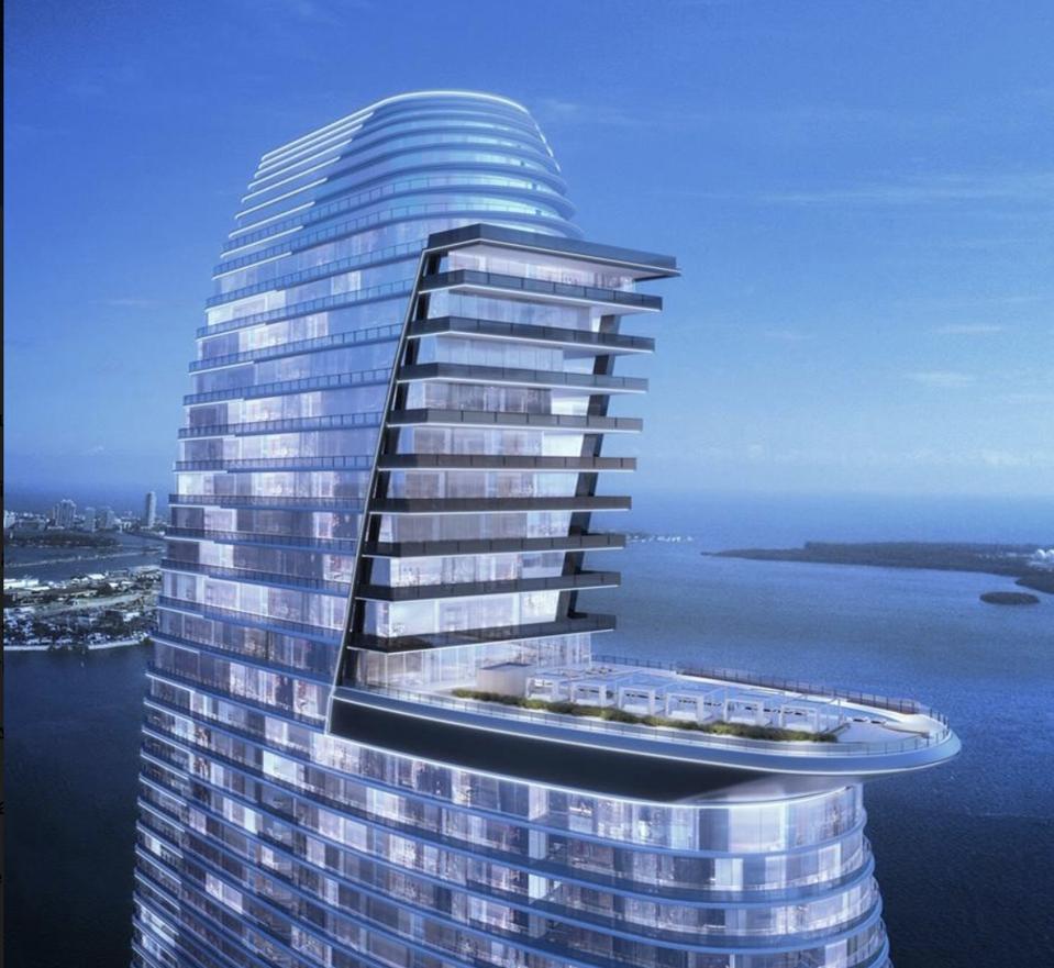 The windsail design allows the penthouse levels to look over the pool and cityscape beyond.