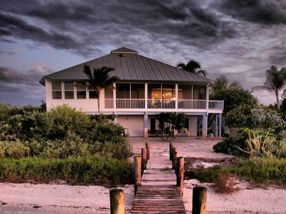 A Fort Myers rental home with a dock and private beach.