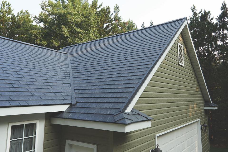 The metal tile roof looks like slate but is metal.