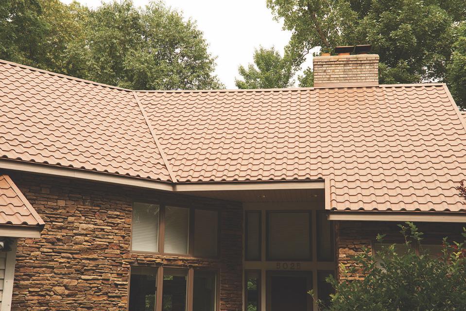 This roof looks like a tile roof but are metal tiles by CertainTeed.