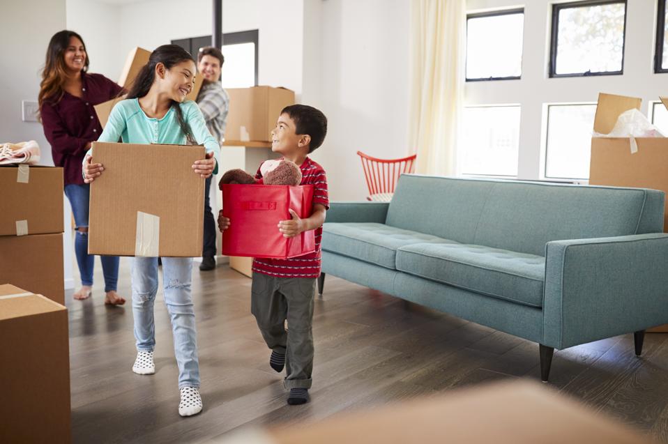 Home buyers move into their new home.