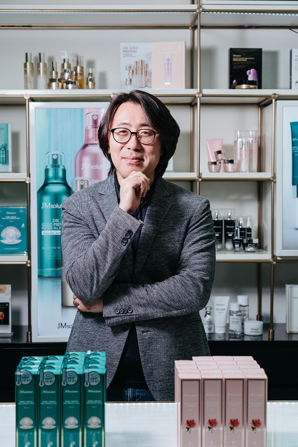 Kim poses in JM Solution's flagship store in Myeongdong, known as the epicenter of K-Beauty.