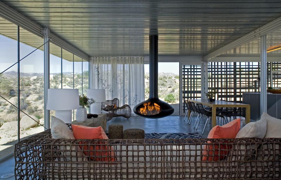Heat is absorbed by the large glazing in this itHouse in Pioneertown, CA. The house was designed by Taalman Koch Architects