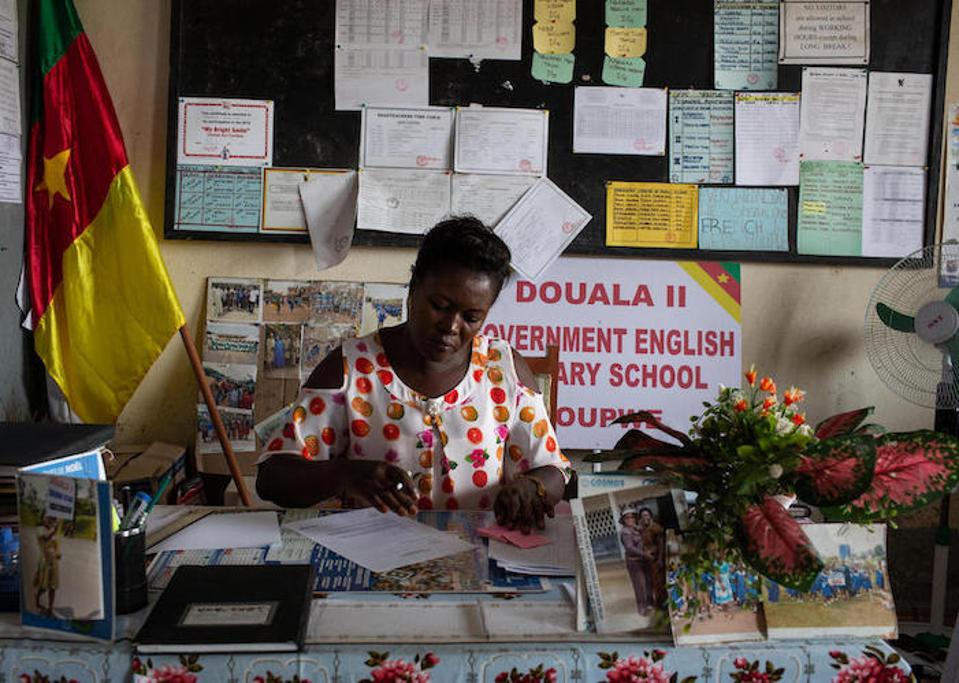 Si Delphine Bikajuri ay punong-guro ng GEPS Youpwe, isang pangunahing paaralan ng gobyerno sa Douala, Cameroon. Ang kanyang anak na babae ay inagaw mula sa kanyang high school kasama ang 150 iba pang mga mag-aaral.