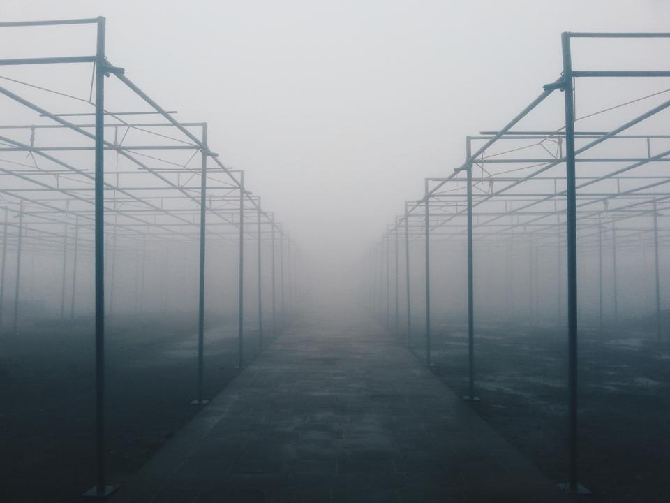 An image of empty, foggy architecture