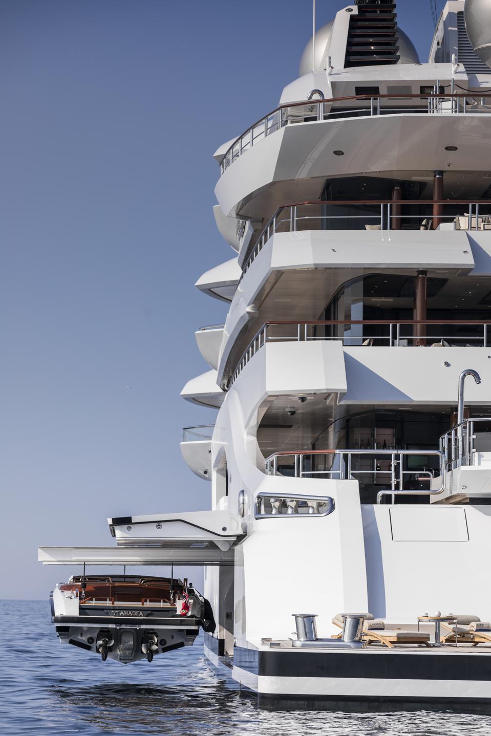One of AMAEDA's two luxury tenders can be easliy deployed from th eside of this massive yacht.