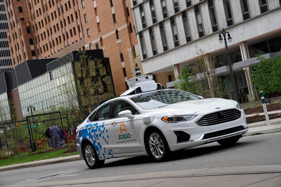 Ford third-generation automated driving test vehicle with bug-washing system