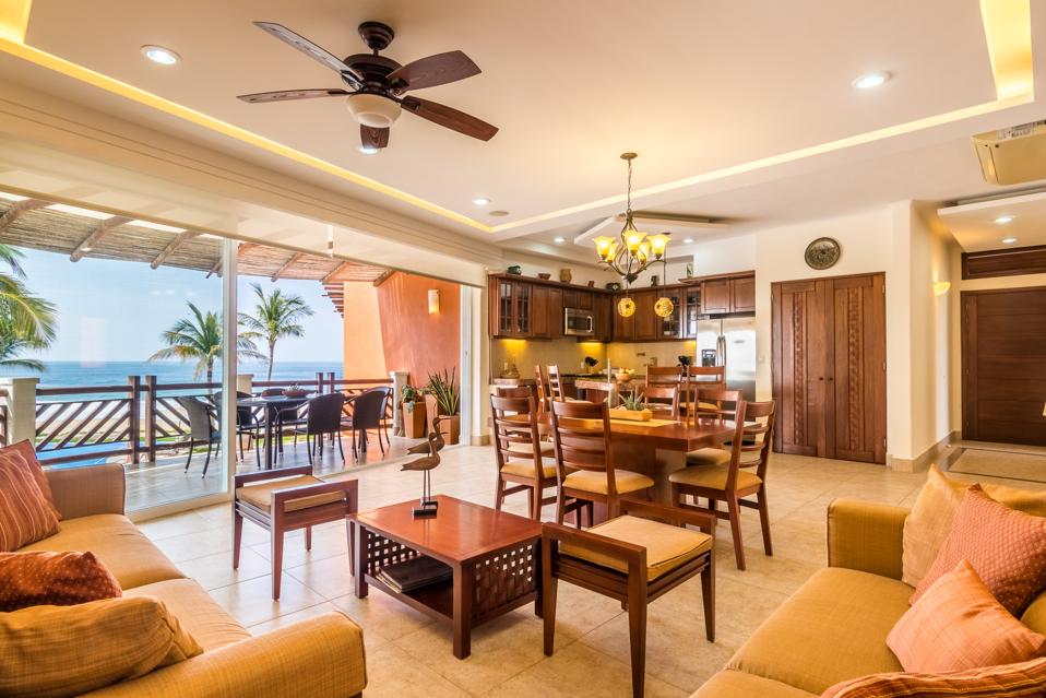 Vivo offers open-concept living and dining with contemporary wood furniture.