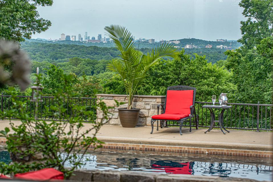 The property has expansive views and Downtown Nashville can be seen in the distance.