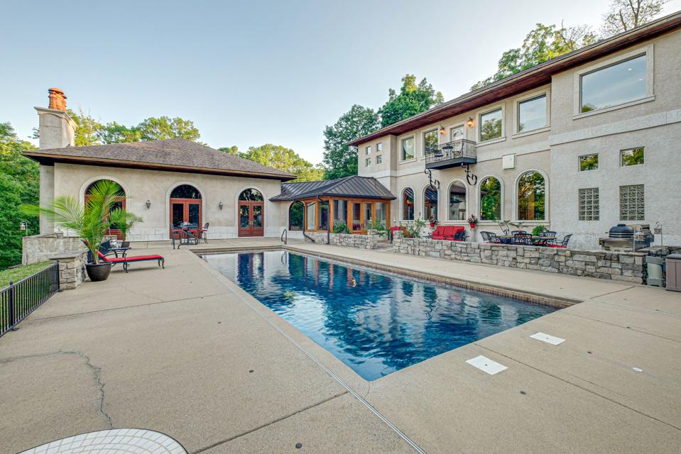 French doors lead from the living room to the swimming pool.
