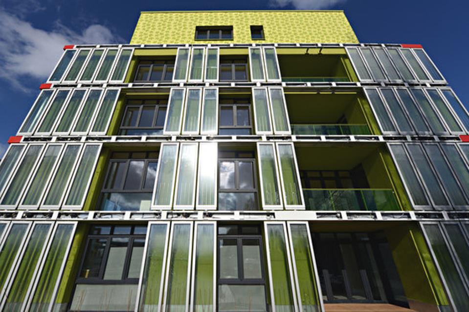The BIQ House in Hamburg, Germany where panels of microalgae absorbs sunlight and passively generate heat for the entire building. This building is the first algae-powered building in the world.