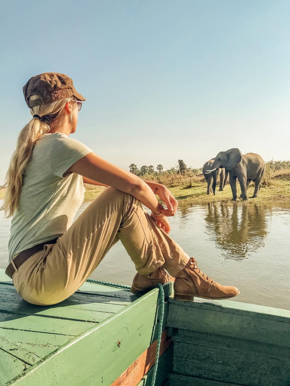 Malawi - Co-founder of We Are Travel Girls, Vaness Rivers in Malawi on a river safari