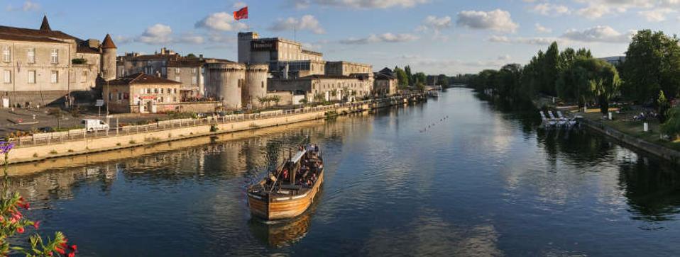 The Charente River flows through Cognac and is lined with several Cognac producers' chateaux.