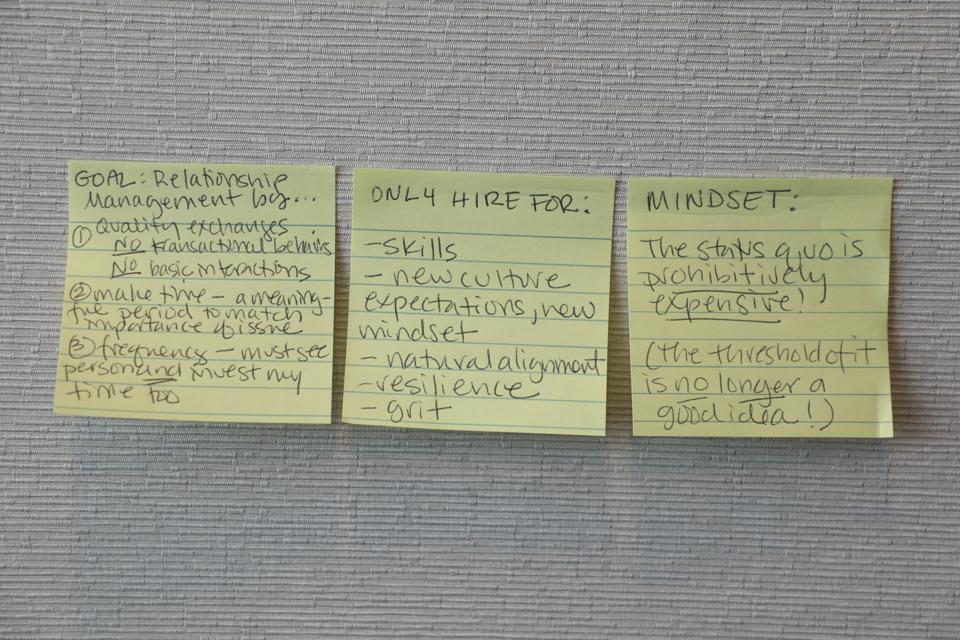 Dr. Carstarphen posts visible reminders of her desired culture at her desk.