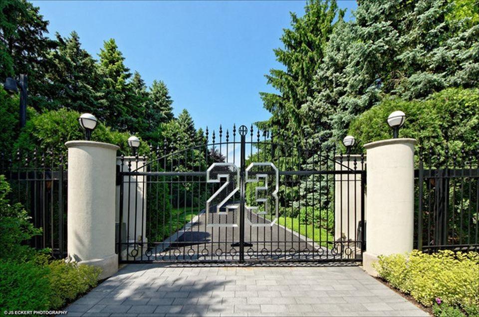 Exterior gate leading to Michael Jordan's Highland Park home, which has been on the market for over seven years.