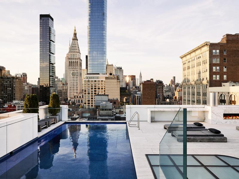 This $30 Million Flatiron Penthouse Boasts A Private Rooftop Pool And A Two-Story Wall Of Swiss Alps Marble