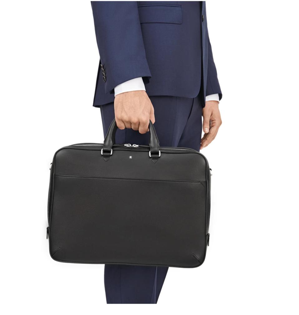 man holding briefcase