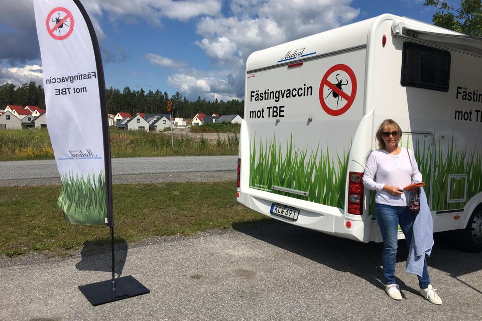 The writer waiting at a touring vaccination clinic in the Stockholm archipelago