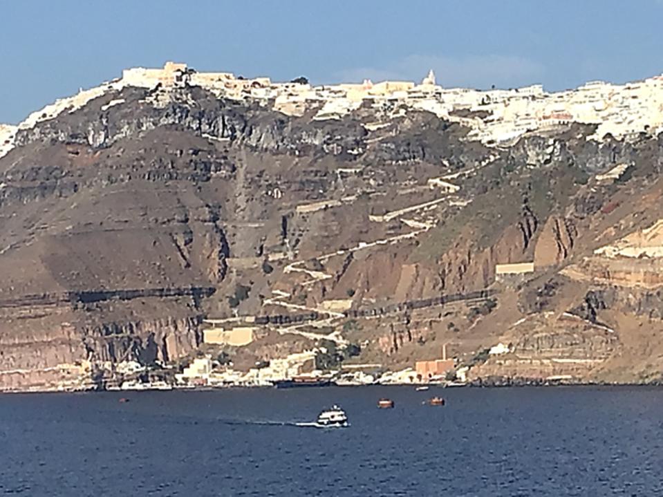 The town of Fira on Santorini perched on the cliff of the ancient volcanic caldera