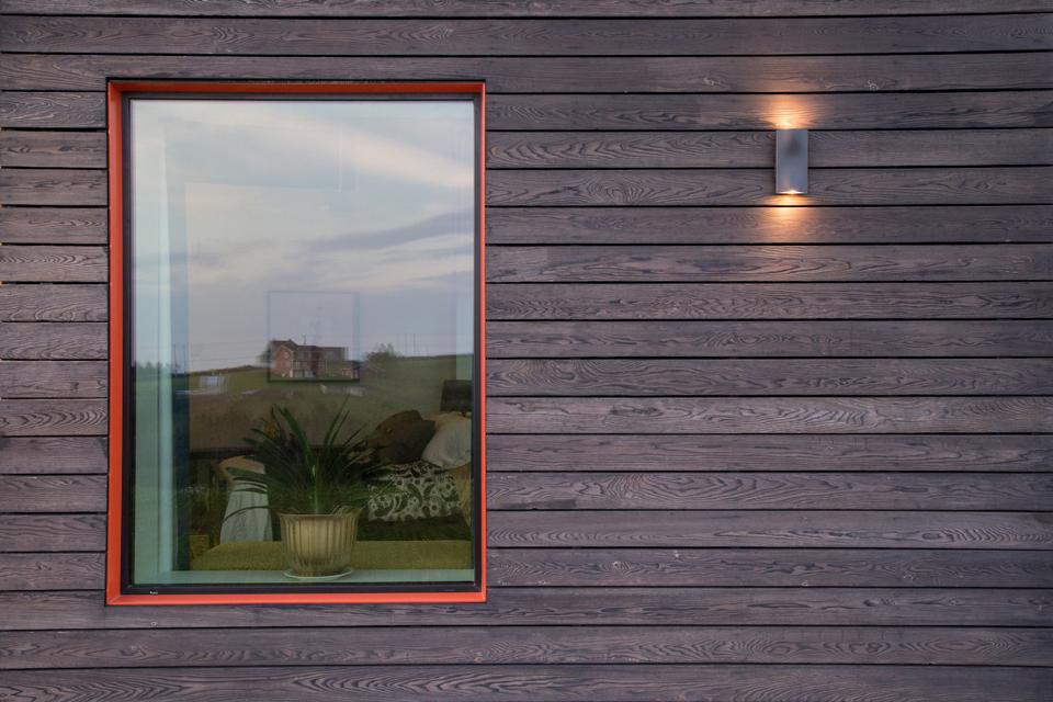 A closeup of Shou Sugi Ban on the Groundswell House.