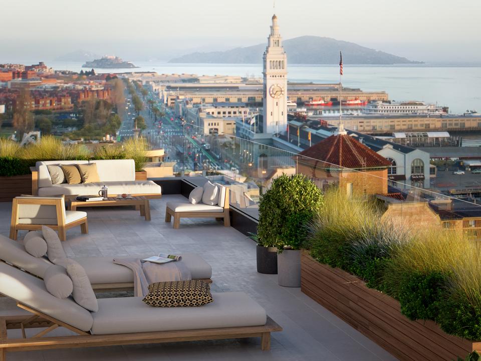 Outdoor amenity spaces offer panoramic views of Treasure Island and the iconic Ferry Building.