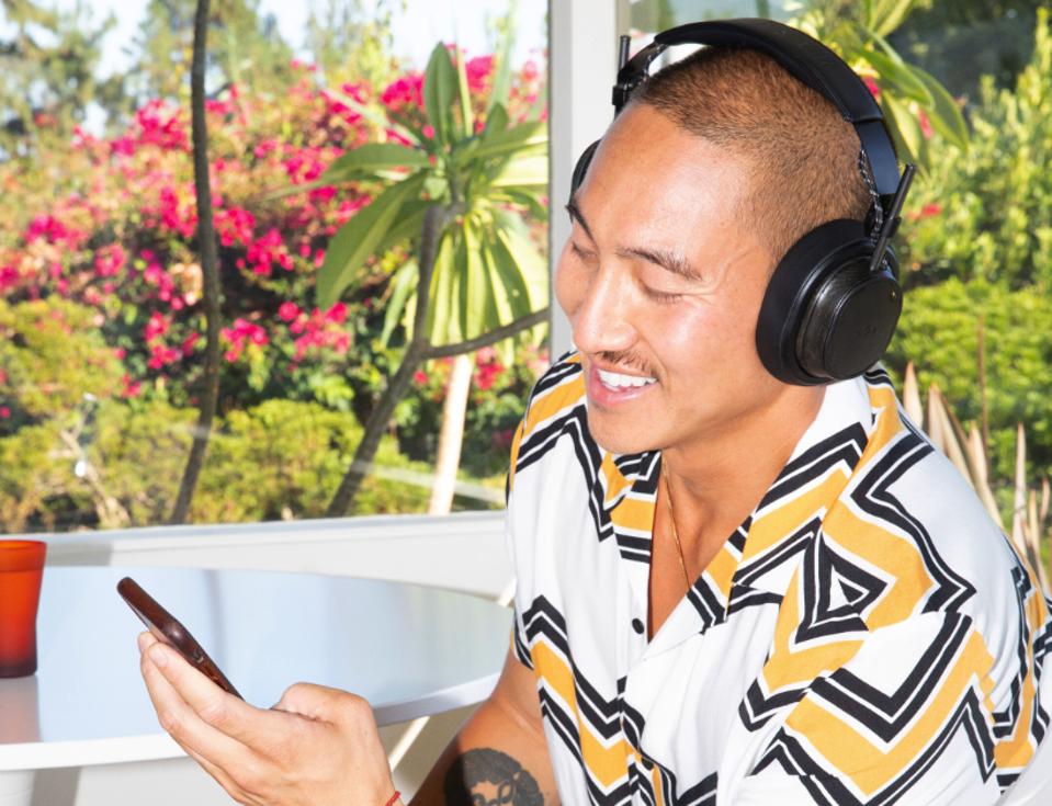 holiday destinations 2019 A man wearing House of Exodus earphones