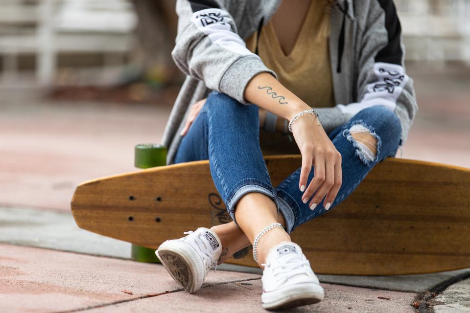 holiday destinations 2019 A woman wearing a 4Ocean bracelet