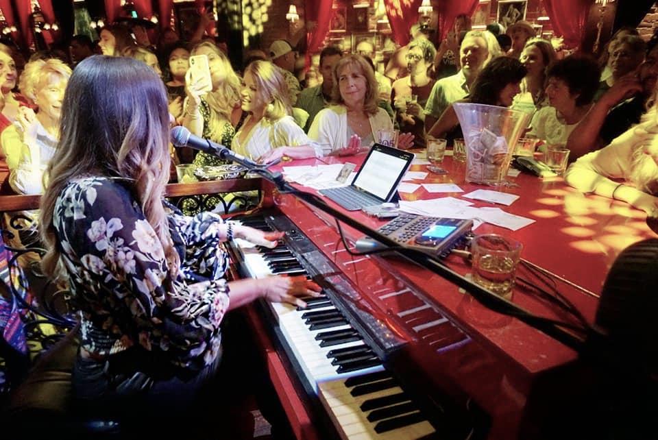 Angel at work: Sarah Angel entertains the cruise ship crowd