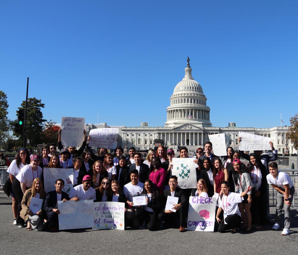 Members of the Youth Movement Against Alzheimer's disease deliver their message in the nation's capital.