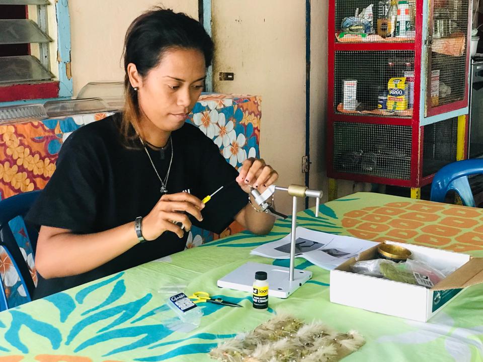 Locals make flies for fly fishing