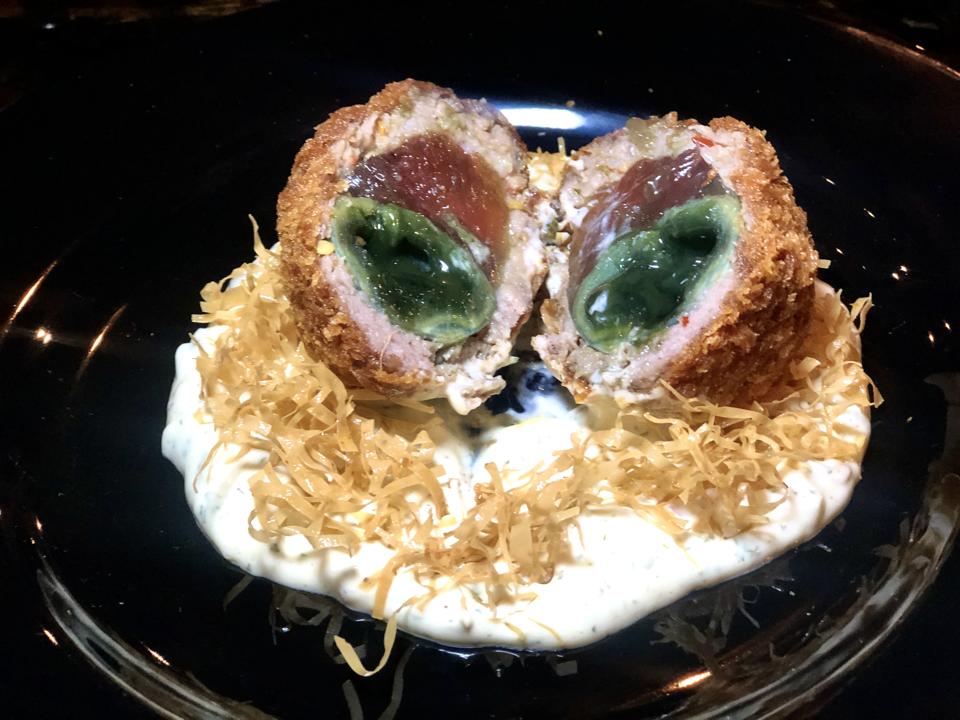 ″Birdʻs Nest″ Scotch Egg with tartar sauce and century egg at XO restaurant in Honolulu